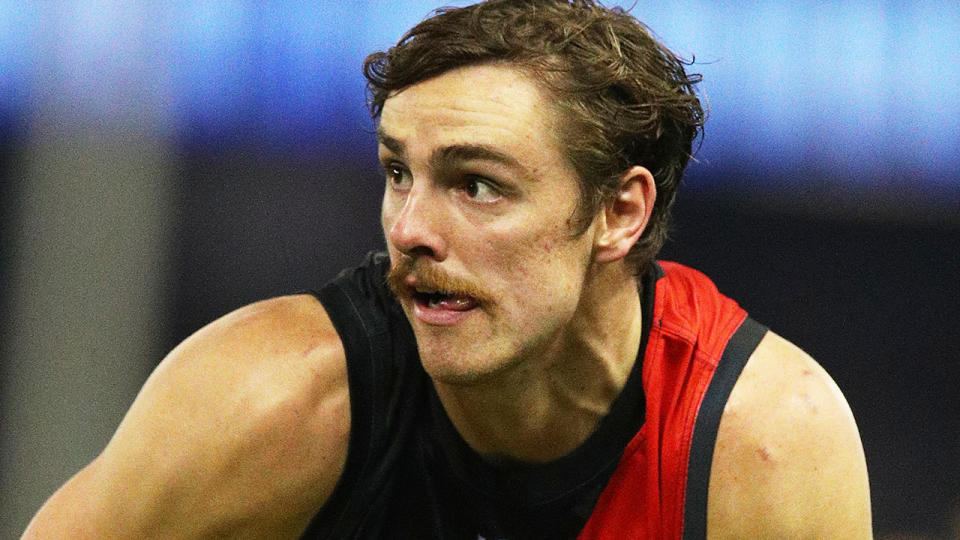 Joe Daniher, pictured playing for Essendon, will stay with the Bombers after a potential trade to Sydney didn't eventuate.