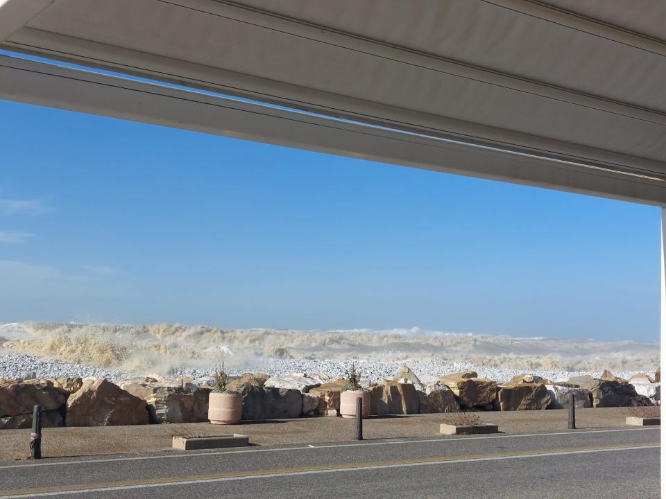 High waves from the sea reaching the beach in Marina di Pisa, Tuscany 