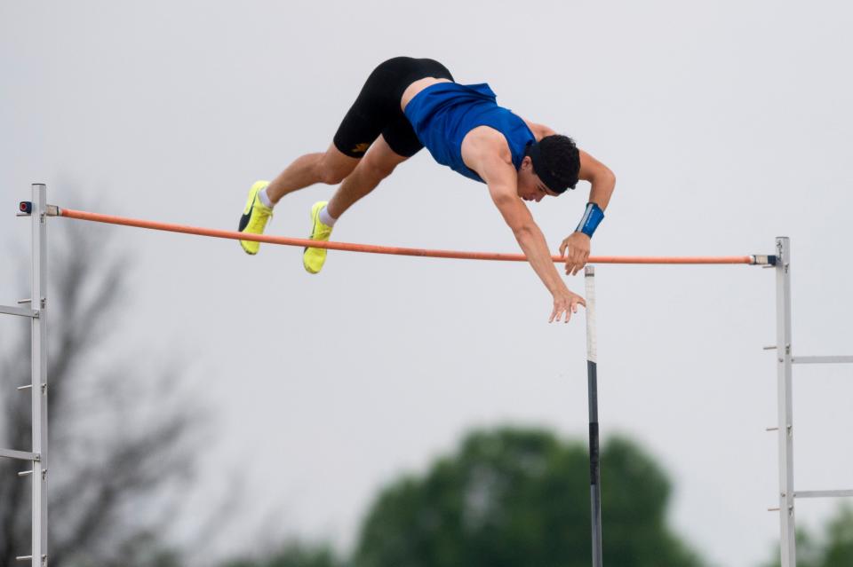 Castle’s Parker Speth clears 15 feet during the pole vault event of the IHSAA Boys Track and Field sectional 32 at Central High School in Evansville, Ind., Thursday, May 19, 2022. 