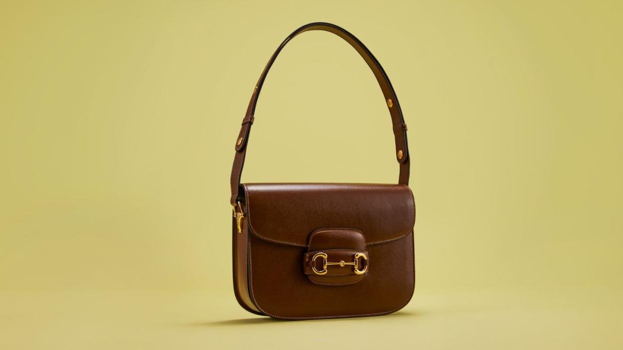 a brown leather purse