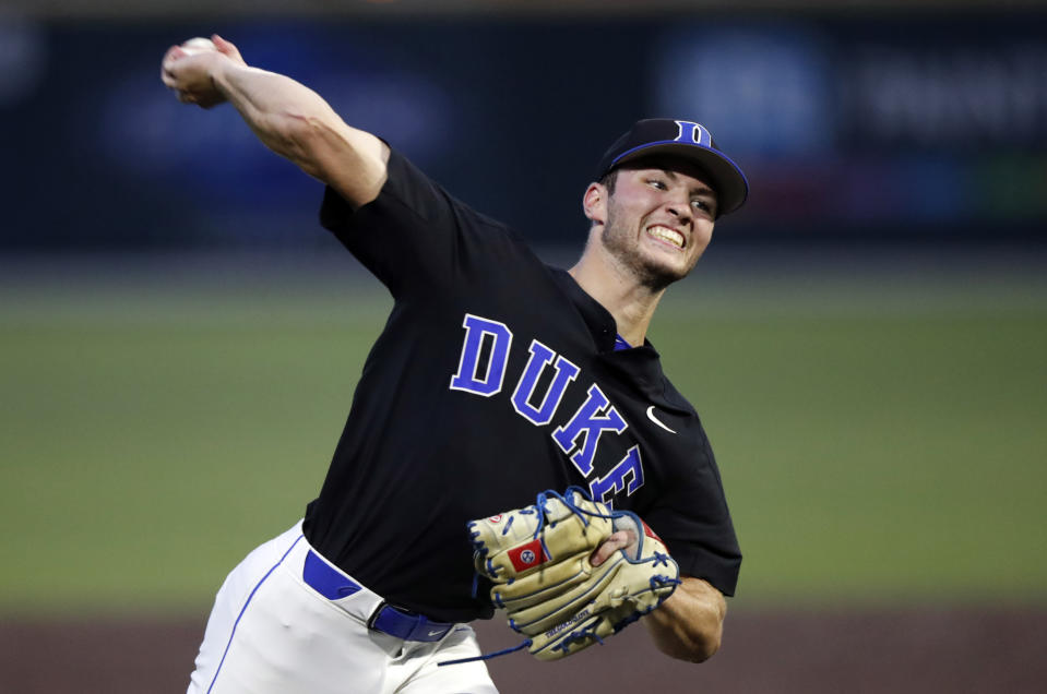 Duke's Bryce Jarvis throws to a Vanderbilt batter in the first inning of an NCAA college baseball tournament super regional game Saturday, June 8, 2019, in Nashville, Tenn. (AP Photo/Wade Payne)