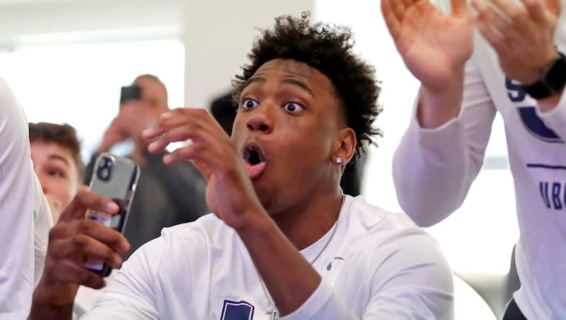 Utah State forward Great Osobor reacts Sunday afternoon as it's revealed that the Aggies will play TCU in the first round of the NCAA Tournament Friday in Indianapolis.