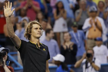 Aug 5, 2017; Washington, DC, USA; Alexander Zverev of Germany waves to the crowd after his match against Kei Nishikori of Japan (not pictured) in a men's singles semifinal at Fitzgerald Tennis Center. Mandatory Credit: Geoff Burke-USA TODAY Sports