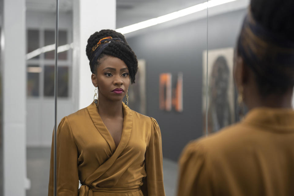 This image released by Universal Pictures shows Teyonah Parris in a scene from "Candyman," directed by Nia DaCosta. (Parrish Lewis/Universal Pictures and MGM Pictures via AP)