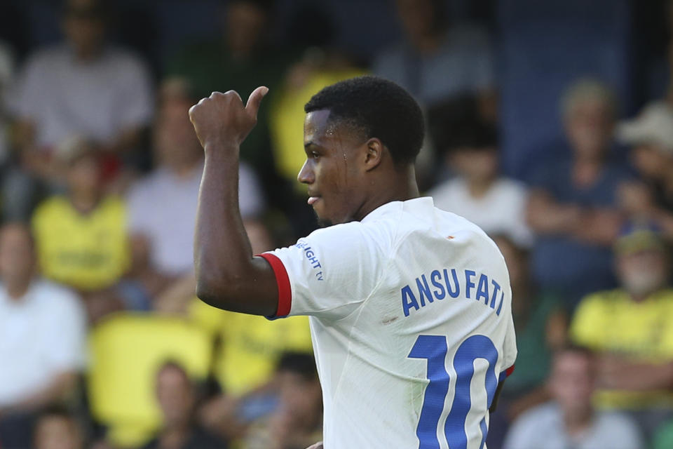 Barcelona's Ansu Fati gestures during a Spanish La Liga soccer match between Villarreal and Barcelona at the Ceramica stadium in Villarreal, Spain, Sunday, Aug. 27, 2023. (AP Photo/Alberto Saiz)