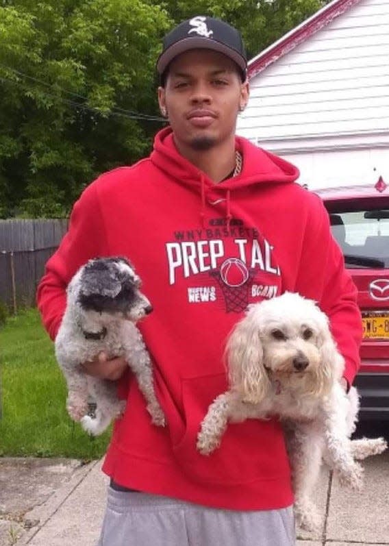 Dom Welch with his family dogs Bee Bee and Sasha.