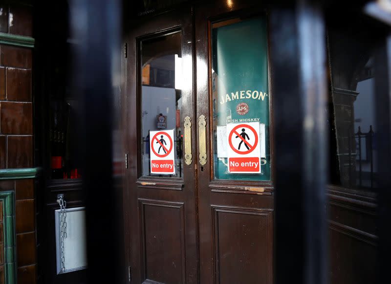 Pub doors are locked in the Temple Bar area, as bars across Ireland are to close voluntarily to curb the spread of coronavirus in Dublin