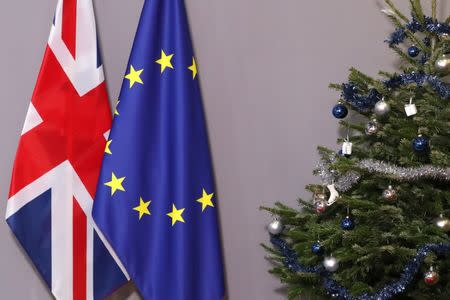 British and European Union flags are seen next to Christmas tree before arrival of British Prime Minister Theresa May to meet European Council President Donald Tusk, at the EU Council headquarters in Brussels, Belgium December 11, 2018. REUTERS/Yves Herman