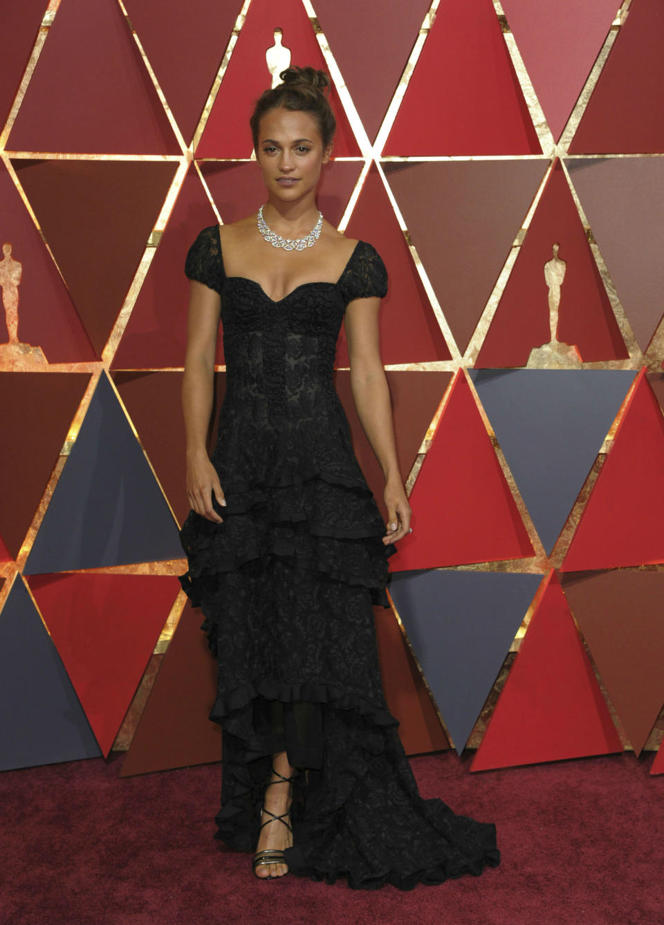 <p>La estrella sueca no acudió a los últimos Oscars y su ausencia se notó en la alfombra roja. Hace dos años llegó al Dolby Theatre con un elegante Louis Vuitton de encaje. (Foto: Gtres). </p>