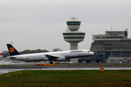 FILE PHOTO: A Lufthansa Airbus A321-200 plane is seen at Tegel airport in Berlin, Germany, November 2, 2017. REUTERS/Axel Schmidt/File Photo