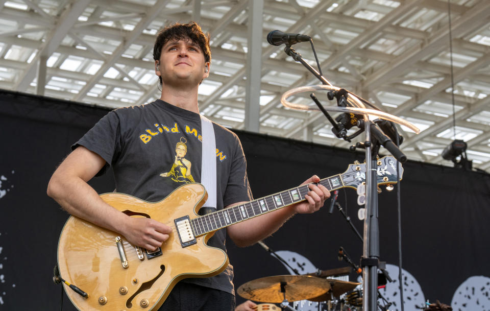 Vampire Weekend's singer Ezra Koenig performs during a concert at the Moody Amphitheater while a total solar eclipse progresses across North America, in Austin, Texas, on April 8, 2024. This year's path of totality is 115 miles (185 kilometers) wide and home to nearly 32 million Americans, with an additional 150 million living less than 200 miles from the strip. The next total solar eclipse that can be seen from a large part of North America won't come around until 2044. (Photo by Suzanne CORDEIRO / AFP) (Photo by SUZANNE CORDEIRO/AFP via Getty Images)