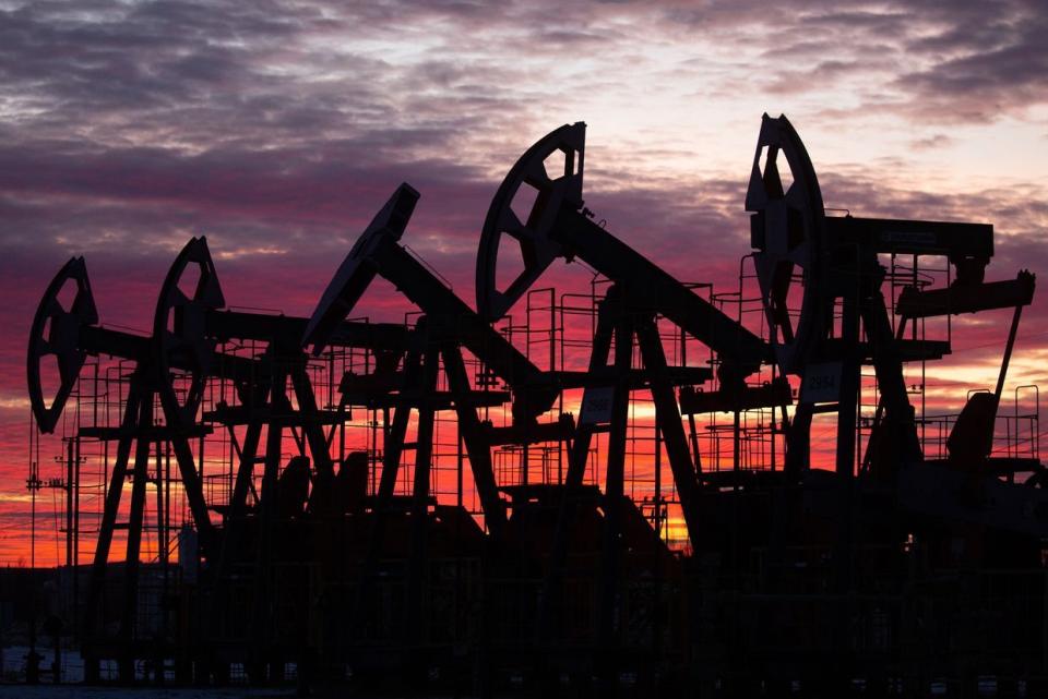 Oil pumping jacks, also known as "nodding donkeys," in an oilfield near Neftekamsk, in the Republic of Bashkortostan, Russia, on Nov. 19, 2020. (Andrey Rudakov/Bloomberg via Getty Images)