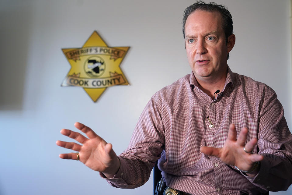 Cook County Sheriff's Commander Jason Moran talks Monday, Nov. 13, 2023, at his Maywood, Ill., office about the process in the postmortem identification of a person who self-identified as Seven. “That’s a horrible circumstance that someone could die and no one knows who they are. That’s why we pursue these cases so strongly, out of dignity,” says Moran, who oversees the sheriff’s missing persons unit. “A person deserves a name.” (AP Photo/Charles Rex Arbogast)