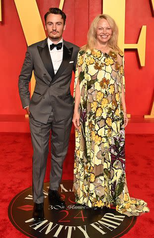 <p>Jon Kopaloff/Getty </p> Pamela Anderson and her son Brandon Thomas Lee at 2024 Vanity Fair Oscar Party