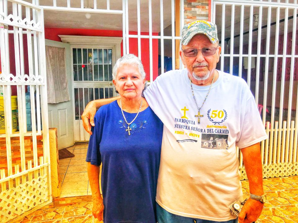 Ramona and Santos Lopez Caraballo stand outside their home in Arecibo, Puerto Rico, on Oct. 10, 2017. The couple had no cell service or other communication for 15 days after Hurricane Maria hit. (Photo: Caitlin Dickson/Yahoo News)