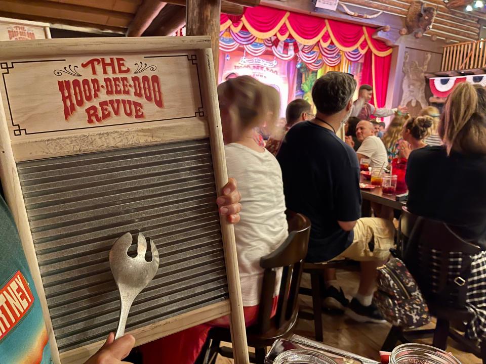 Hoop-De-Doo Revue at Disney - a metal washing baord with a fork on it