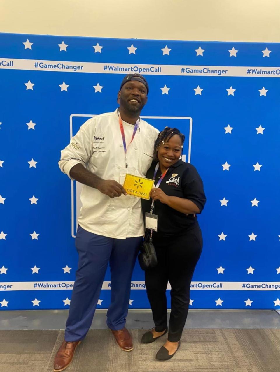 Chris and Regina Moore of Chef Flavas hold the "golden ticket" letting them know that their Spinach Artichoke Dip will now be distributed by Walmart.  They were chosen as part of Walmart's 9th annual Open Call contest.