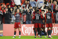 Toronto FC forward Federico Bernardeschi (10) celebrates with teammates after scoring a goal against FC Dallas that was later overturned upon video replay during first-half MLS soccer match action in Toronto, Saturday, May 4, 2024. (Christopher Katsarov/The Canadian Press via AP)