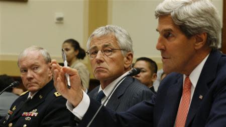 (L-R) U.S. General Martin Dempsey, chairman of the Joint Chiefs of Staff, U.S. Secretary of Defense Chuck Hagel and U.S. Secretary of State John Kerry testify at a U.S. House Foreign Affairs Committee hearing on Syria on Capitol Hill in Washington, September 4, 2013. The U.S. Senate Foreign Relations Committee struggled on Wednesday to reach agreement on a resolution authorizing military strikes in Syria, but scheduled a vote for later in the day as Obama administration officials pressed for action in Congress. REUTERS/Jason Reed