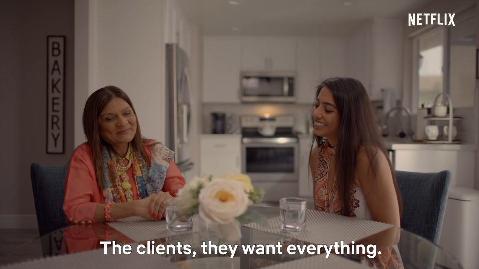 Sima Aunty talking to one of her clients at the client's house