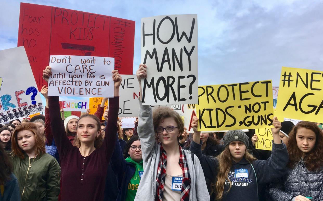 Students at Roosevelt High School take part in a protest against gun violence  - AP