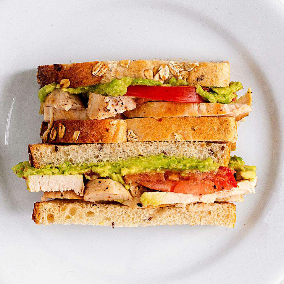 <p>In this healthy chicken sandwich recipe, the avocado is mashed to create a healthy creamy spread.</p> <p> <a href="https://www.eatingwell.com/recipe/250881/avocado-tomato-chicken-sandwich/" rel="nofollow noopener" target="_blank" data-ylk="slk:View Recipe;elm:context_link;itc:0;sec:content-canvas" class="link ">View Recipe</a></p>