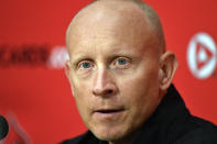 Louisville coach Chris Mack answers questions during an NCAA college basketball news conference at the team's media day in Louisville, Ky., Tuesday, Oct. 19, 2021. (AP Photo/Timothy D. Easley)