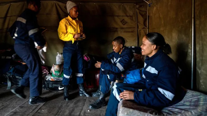 Firefighters from South Africa are among the crews working in Alberta, Canada, to help with ongoing fire suppression efforts. - Shiraaz Mohamed/AFP/Getty Images