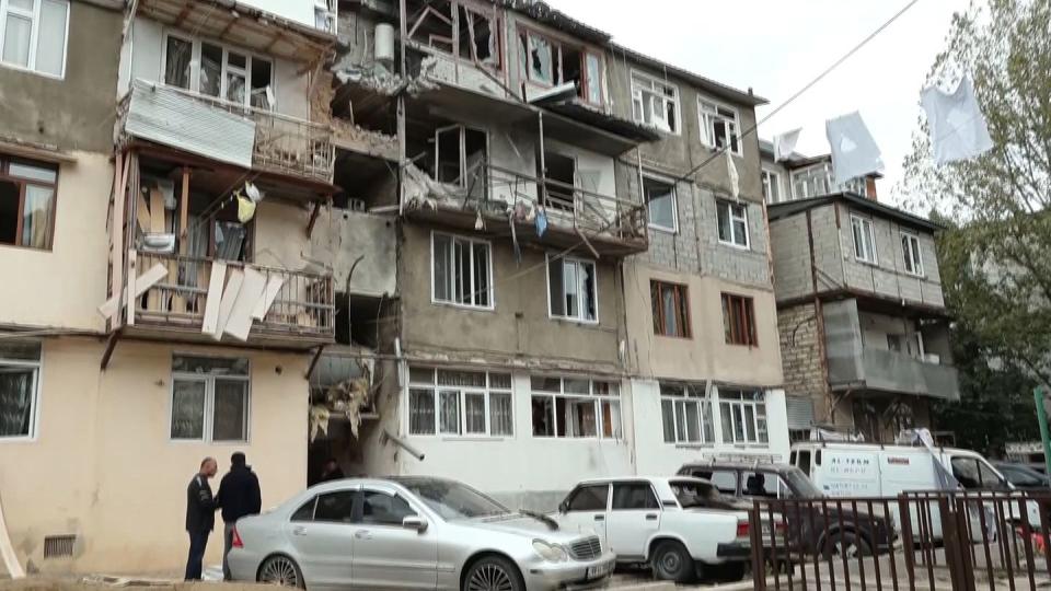A damaged residential apartment building following shelling is seen in Stepanakert in the breakaway territory of Nagorno-Karabakh in Azerbaijan. (Twitter via AP)