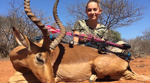 Images such as this one went viral last week, depicting Gourdin posing with animals she had hunted. Source: Facebook/BraidsandBows