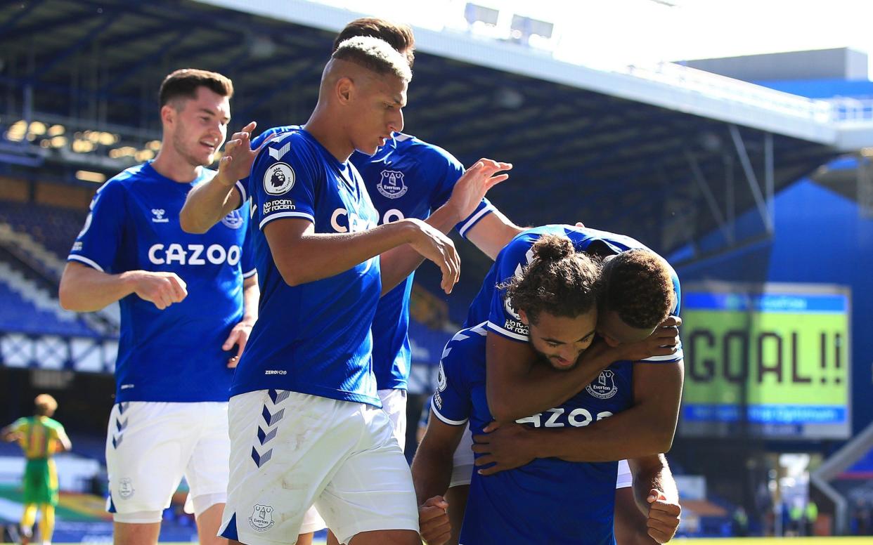 Dominic Calvert-Lewin of Everton celebrates scoring their 5th goal with Richarlison and Yerry Mina during the Premier League match between Everton and West Bromwich Albion at Goodison Park on September 19, 2020 in Liverpool - Getty Images