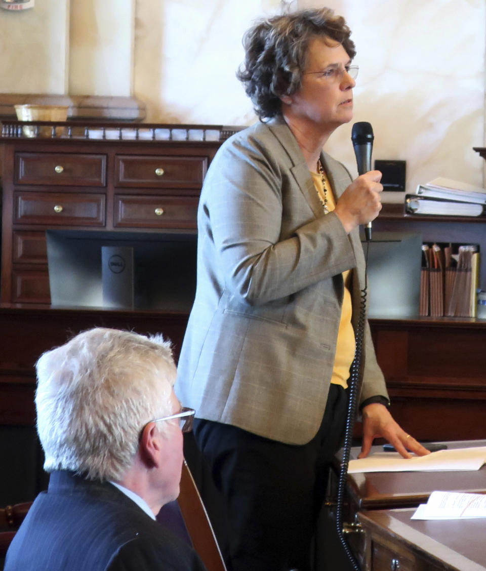 Kansas state Sen. Carolyn McGinn, R-Sedgwick, explains her vote in favor of a Republican tax relief bill, Thursday, Feb. 7, 2019, at the Statehouse in Topeka, Kan. McGinn described herself as a reluctant supporter of the bill to adjust income tax laws, saying lowering the state's 6.5 percent sales tax on food is a higher priority for her. (AP Photo/John Hanna)