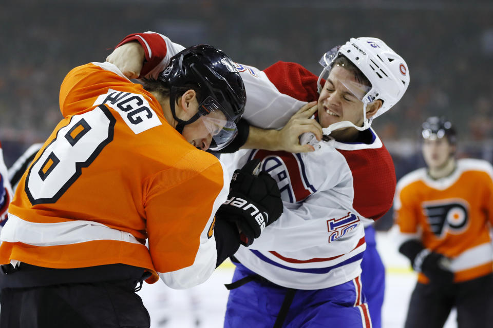 Montreal Canadiens' Jesperi Kotkaniemi, right, and Philadelphia Flyers' Robert Hagg fight during the third period of an NHL hockey game, Thursday, Jan. 16, 2020, in Philadelphia. (AP Photo/Matt Slocum)