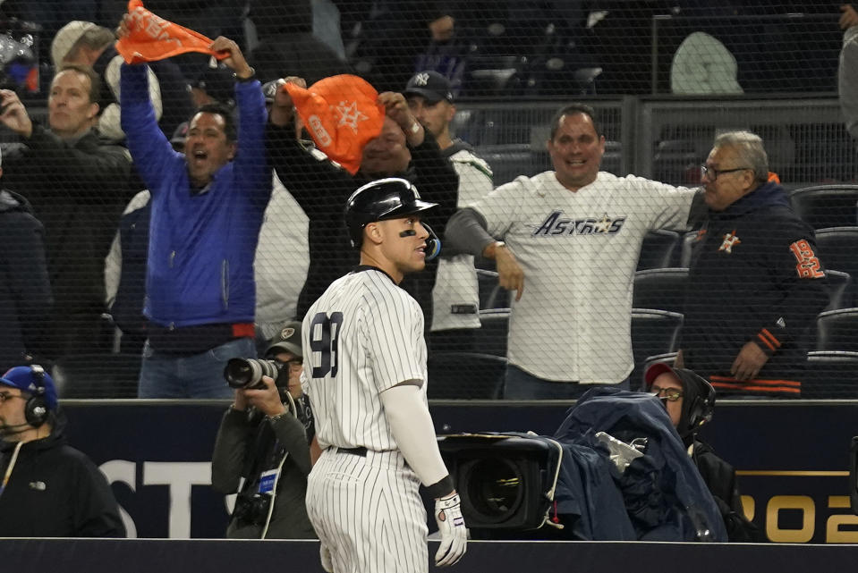 New York Yankees right fielder Aaron Judge (99) walks off the field after grounding out to the Houston Astros to end Game 4 of an American League Championship baseball series, Monday, Oct. 24, 2022, in New York. (AP Photo/Seth Wenig)