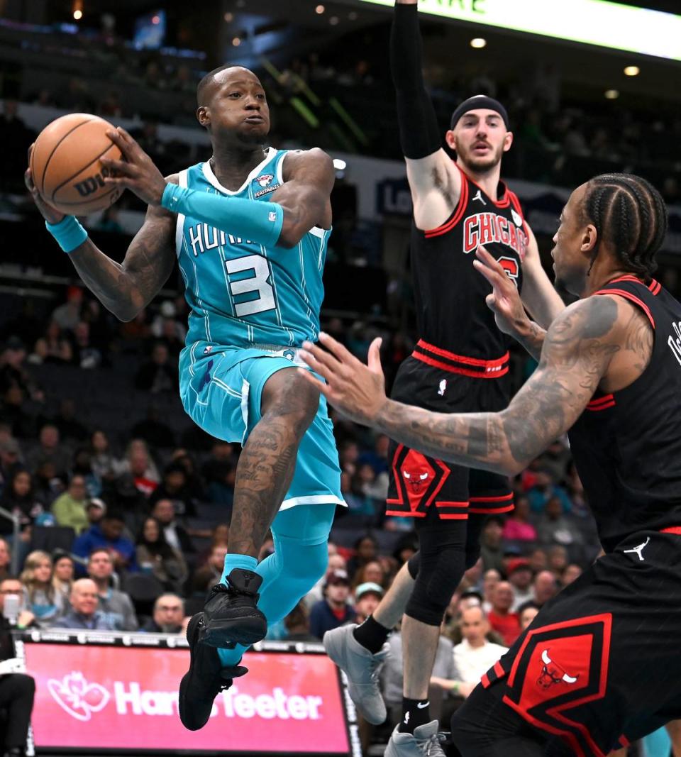 Charlotte Hornets guard Terry Rozier (left) drives into the lane looking to pass as the Chicago Bulls defense in January. Rozier was averaging career highs of 23.2 points and 6.6 assists per game when he was traded Monday to Miami.