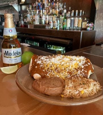 The smothered brisket burrito is on the menu at Cayenne, 4542 N. Prospect Road, Peoria Heights.