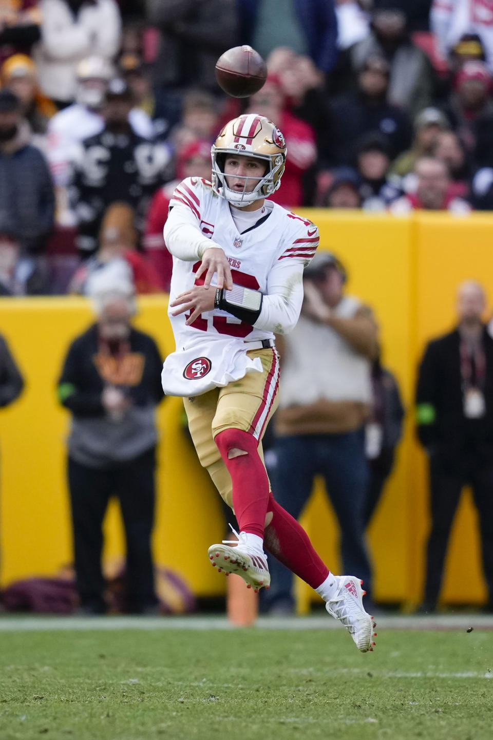San Francisco 49ers quarterback Brock Purdy (13) throws a pass during the second half of an NFL football game against the Washington Commanders, Sunday, Dec. 31, 2023, in Landover, Md. San Francisco won 27-10. (AP Photo/Alex Brandon)