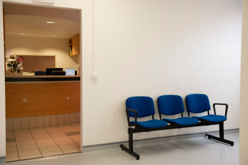 Waiting bench outside of doctor's office in hospital
