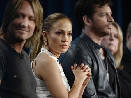 Judges of "American Idol" Keith Urban (L), Jennifer Lopez and Harry Connick Jr. take part in a panel during Fox Broadcasting Company's part of the Television Critics Association (TCA) Winter 2015 presentations in Pasadena, California, January 17, 2015. REUTERS/Kevork Djansezian