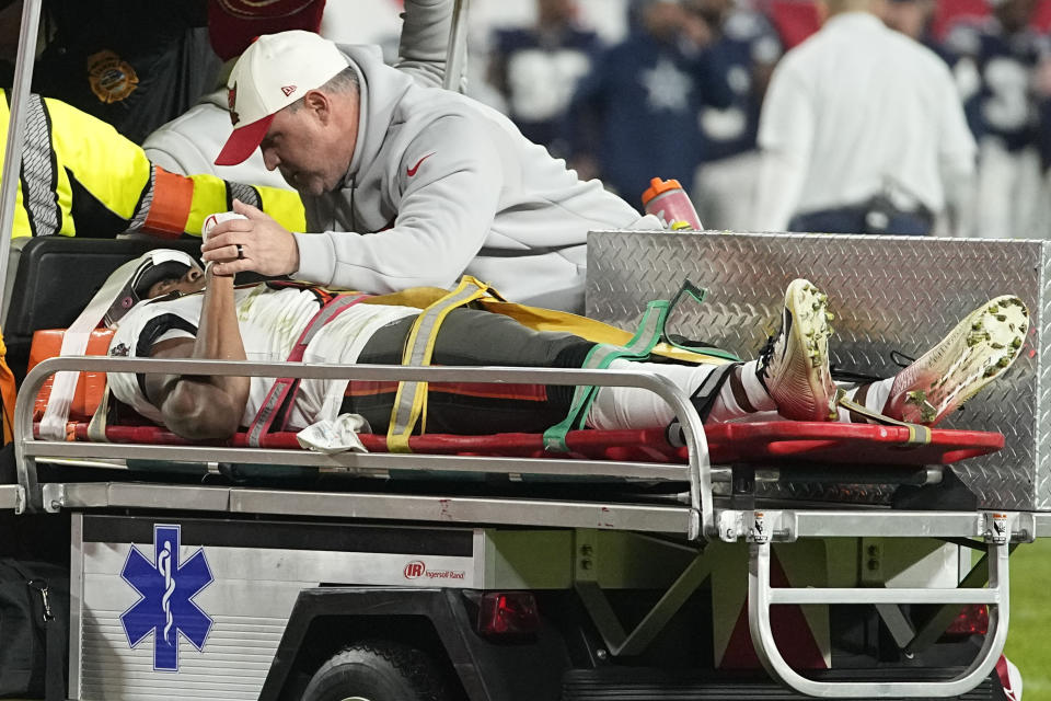 Tampa Bay Buccaneers wide receiver Russell Gage is taken off the filed after being injured against the Dallas Cowboys during the second half of an NFL wild-card football game, Monday, Jan. 16, 2023, in Tampa, Fla. (AP Photo/Chris Carlson)