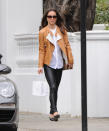 <p>A week before her wedding, Pippa was spotted on the streets of London in skintight leather trousers and a tan leather jacket. <i>[Photo: FameFlynet]</i> </p>