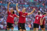 Manchester United's Rachel Williams, center, celebrates after scoring her side's second goal during the Women's FA Cup final soccer match between Manchester United and Tottenham Hotspur at Wembley Stadium in London, Sunday, May 12, 2024. (AP Photo/Kirsty Wigglesworth)