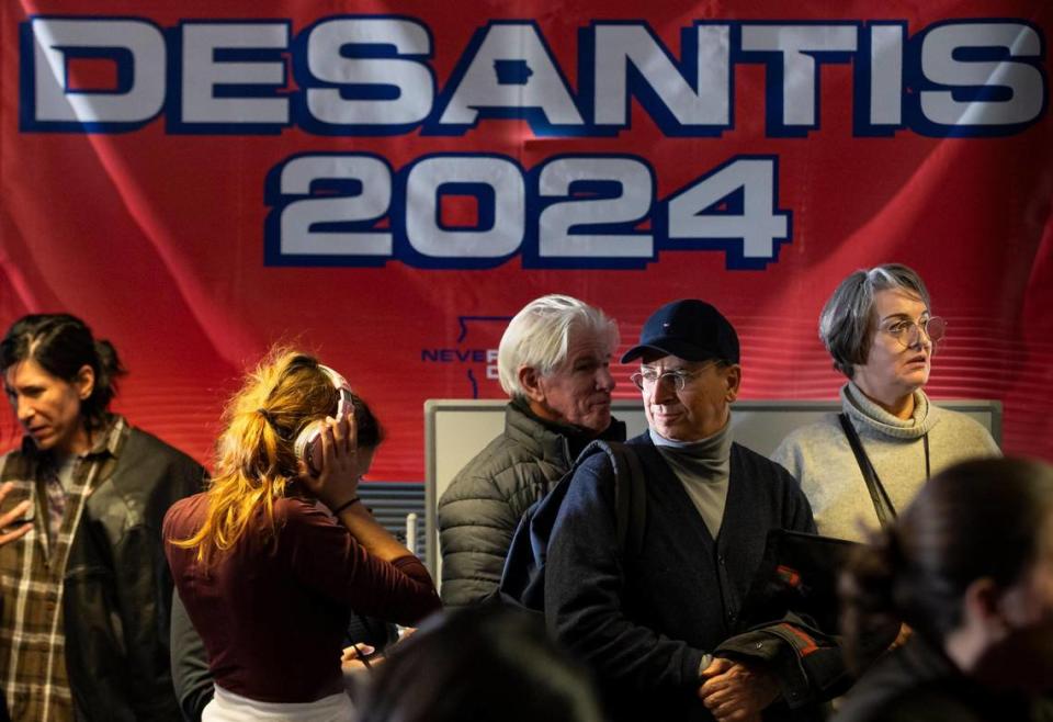 Florida Governor Ron DeSantis supporters wait to hear him speak during a rally at the Never Back Down super PAC headquarters on Saturday, Jan. 13, 2024, in West Des Moines, Iowa. DeSantis, who is campaigning across Iowa, is running for the Republican presidential nomination.