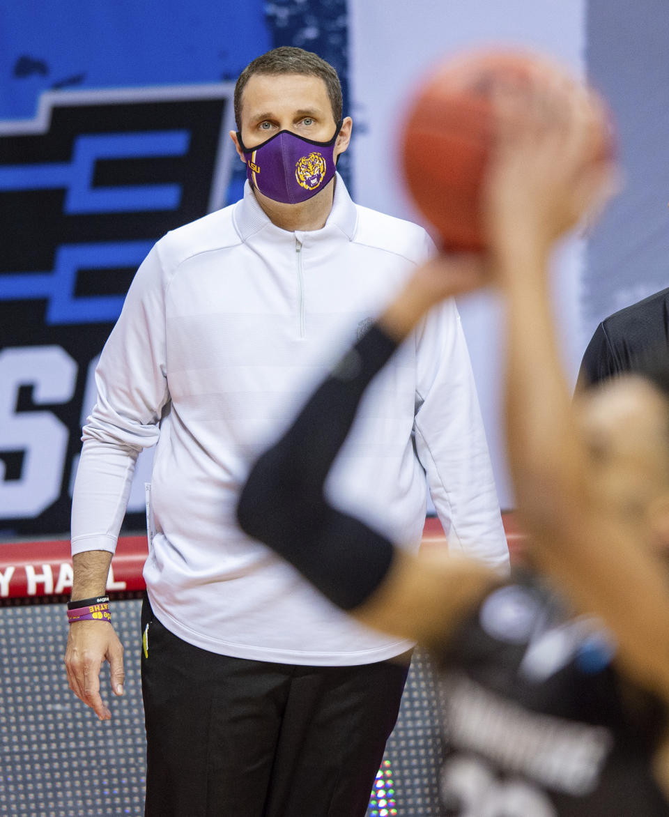 LSU head coach Will Wade watches the action on the court during the first half of a first round game against St. Bonaventure in the NCAA men's college basketball tournament, Saturday, March 20, 2021, at Assembly Hall in Bloomington, Ind. (AP Photo/Doug McSchooler)