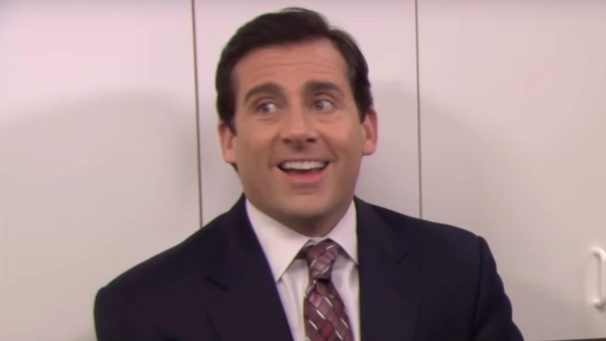  Michael smiling while telling story on The Office. 