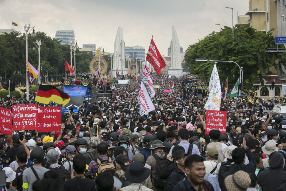 Thousands of pro-democracy protesters march out from the Democracy Monument to the Government House in Bangkok, Thailand, Wednesday, Oct. 14, 2020. Thousands of anti-government protesters gathered Wednesday for a rally at Bangkok's Democracy Monument being held on the anniversary of a 1973 popular uprising that led to the ousting of a military dictatorship, amid a heavy police presence and fear of clashes with political opponents. (AP Photo/Wason Wanichakorn)