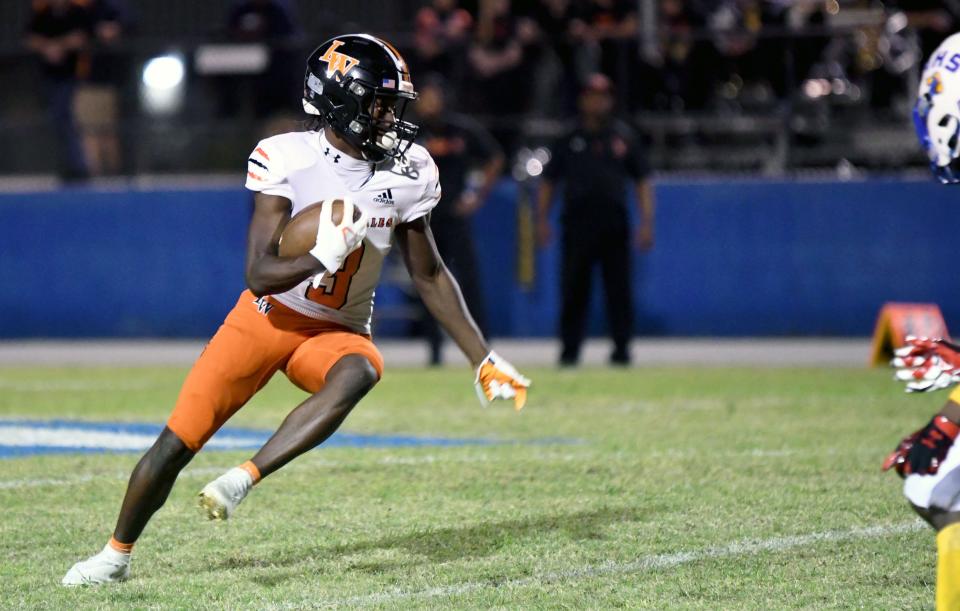 Diyante Landrum returns a punt for Lake Wales during a 3S District 8 championship game win at Auburndale on Friday at Bruce Canova Stadium.