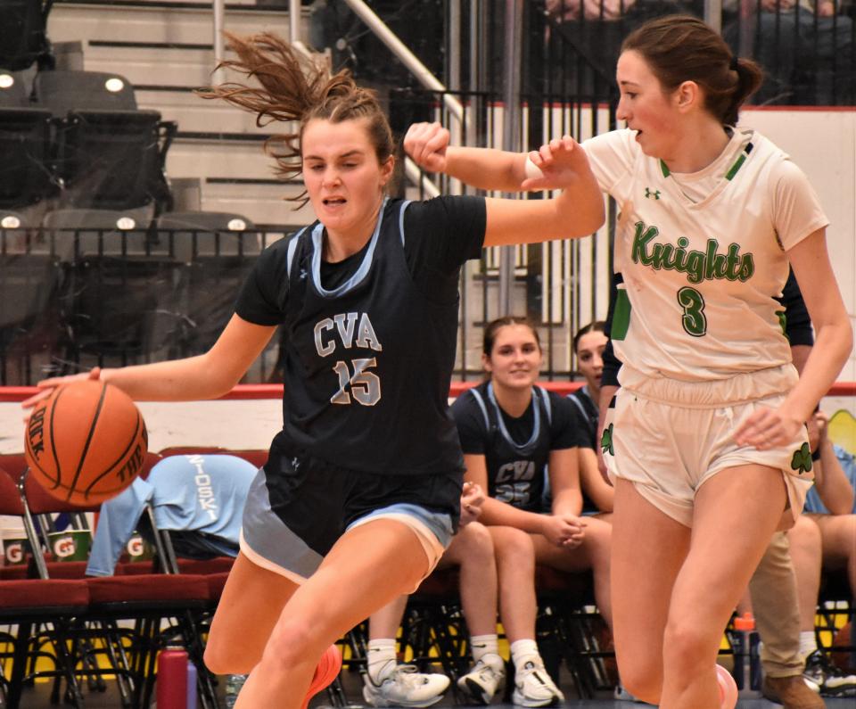 Central Valley Academy's Avery Rich (15) drives against Bishop Ludden Gaelic Knight Ana Donahue Saturday at the Nexus Center.