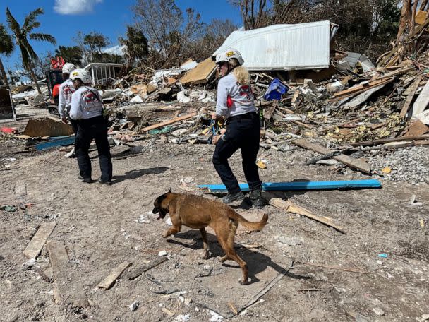 PHOTO: Members of the Virginia Task Force 2 Urban Search and Rescue team search for victims at the Red Coconut RV Park in Fort Myers, Fla. on Oct. 5, 2022. (The Washington Post via Getty Images)