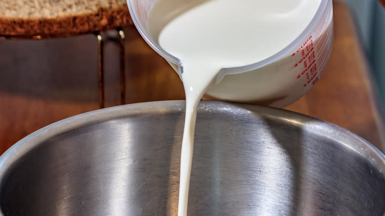 cream pouring into bowl